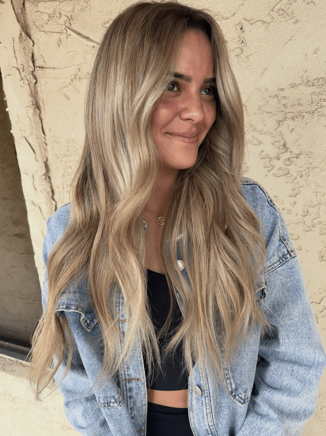 Sunlit blonde balayage with beachy waves, hand painted at Studio One Six in Las Cruces, New Mexico
